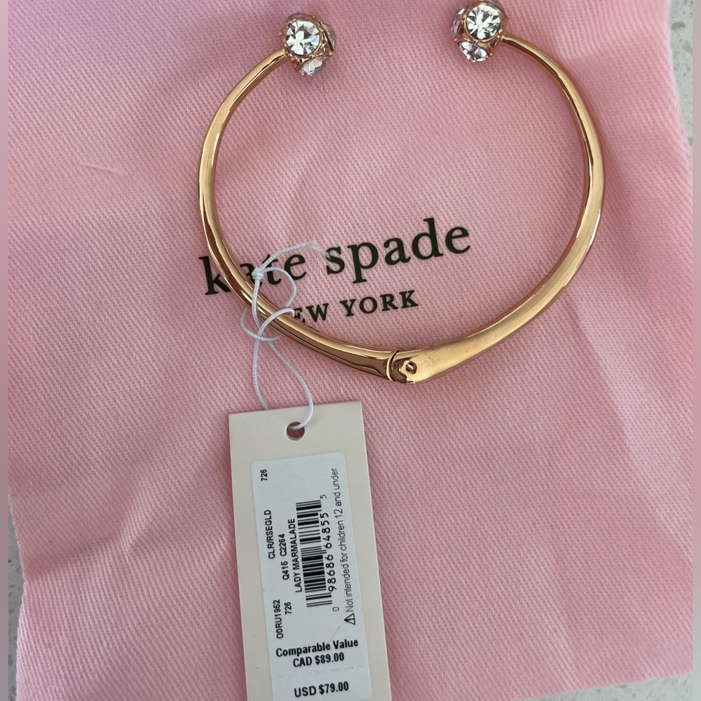 Kate Spade “Lady Marmalade” Cuff rose gold bracelet